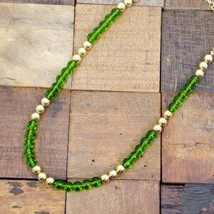 Colorful green glass and gold bead necklace  with all round beads